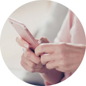 A Lady Scrolling On Her Phone